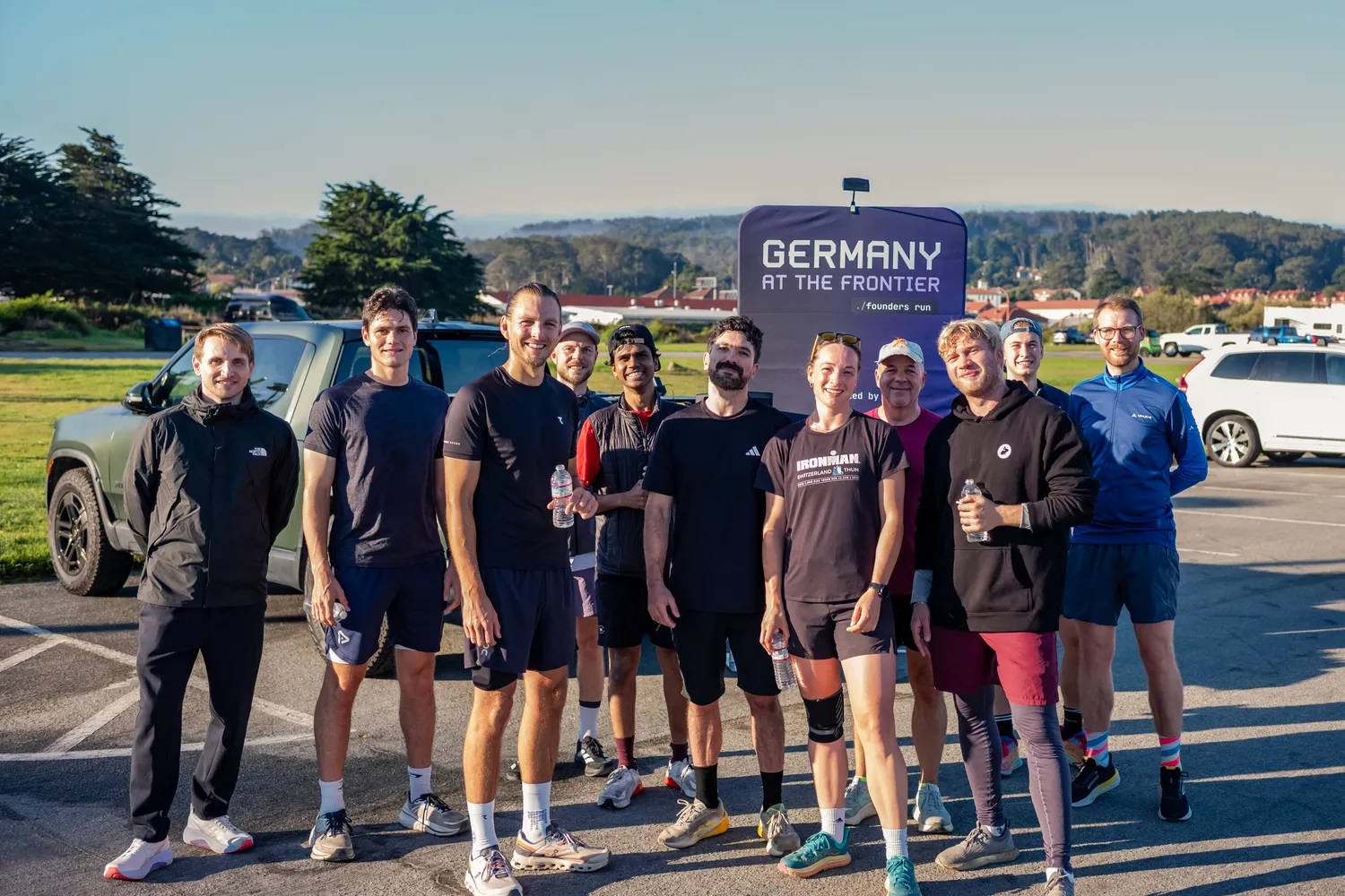 Founder run group photo in front of the Germany at the Frontier sign