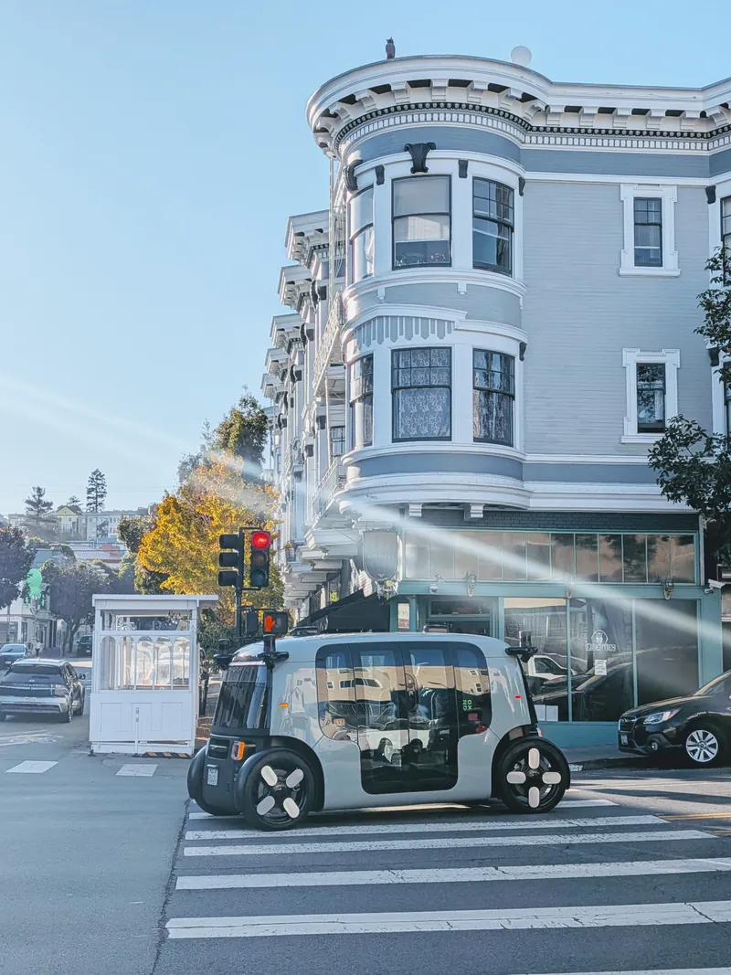 A driverless shuttle at a San Francisco crosswalk
